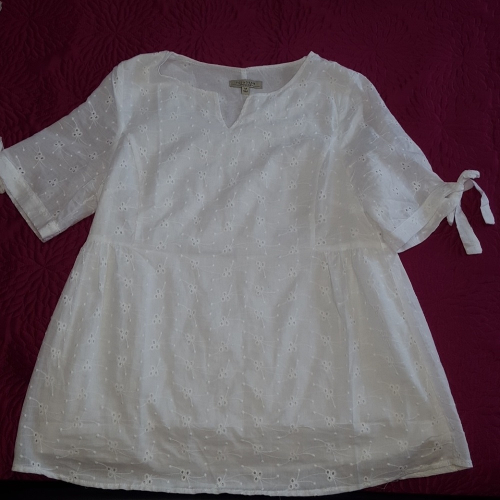 Lacey white eyelet medium tie sleeve top.